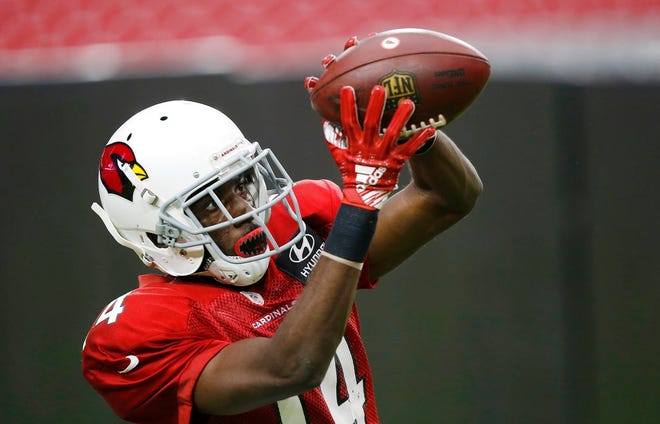 Arizona Cardinals wide receiver J.J. Nelson makes a catch during an NFL football training camp Thursday, Aug. 2, 2018, in Glendale, Ariz. (AP Photo/Ross D. Franklin)