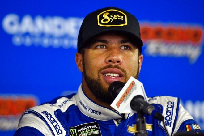 Bubba Wallace answers questions during a media availability for Sunday's NASCAR Cup Series auto race, Saturday, July 28, 2018, in Long Pond, Pa. (AP Photo/Derik Hamilton)