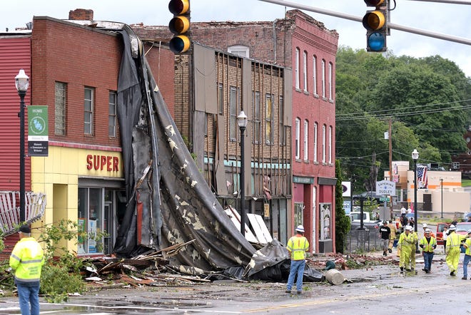 This building on Main Street in Webster had its roof ripped off during the storm Saturday, and the building will be torn down later in the day. [T&G Staff/Steve Lanava]
