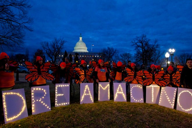 FILE - In this Jan. 21, 2018, file photo, demonstrators rally in support of Deferred Action for Childhood Arrivals (DACA) outside the Capitol Washington. (AP Photo/Jose Luis Magana, File)