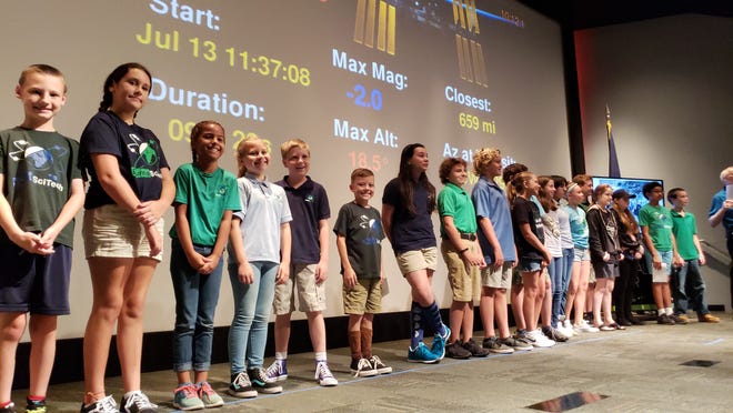 Students from Burns Science and Technology STEM School in Oak Hill had the opportunity July 13 to send their voices in to space through the Amateur Radio International Space Station (ARISS) program. More than 50 students traveled to Kennedy Space Center to participate. At 10:05 the crackling sound of a human voice; Astronaut, Ricky Arnold, spoke from the International space station to the excited crowd. “Greetings from the ISS,” he said, as 17 students lined up on stage to begin their series of questions. [Photo provided]