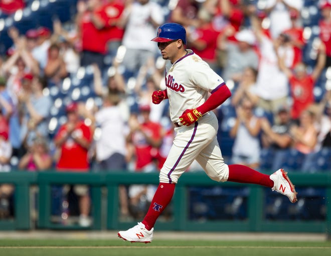 Philadelphia Phillies' Asdrubal Cabrera runs the bases after hitting a two-run home run in the eighth inning of a baseball game against the Miami Marlins on Sunday in Philadelphia. [AP PHOTO/LAURENCE KESTERSON]