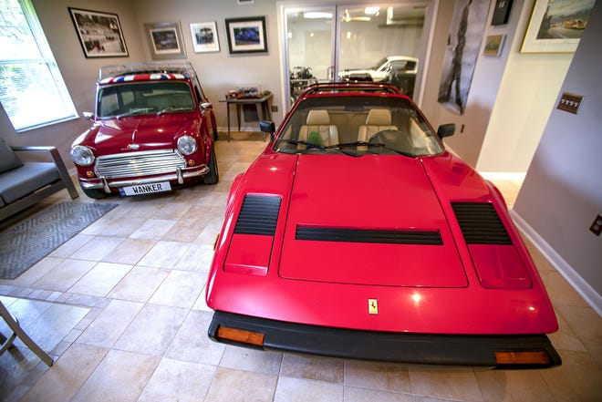 Bob Sturm collects vintage foreign cars and motorcycles. He enjoys the same model Ferrari driven in the 1980s show "Magnum PI." He stores as many vehicles as he can in the home he converted into a show garage.