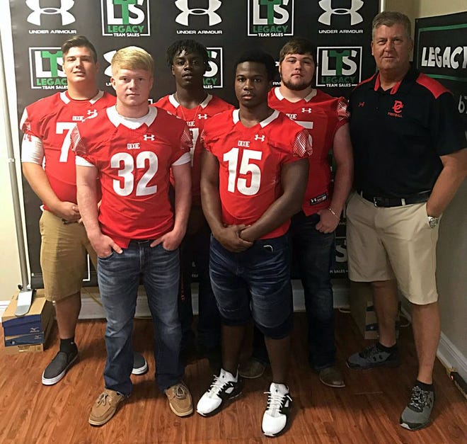 Back row - left to right - Aaron Weeks, Carlos Williams Jr., Jay Storey, coach Eric Richeson; front row - left to right - Eli Bray and Fitzgerald Warren.