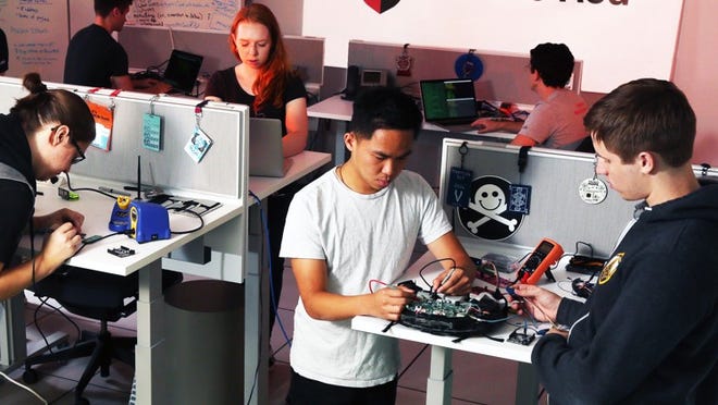 Members of IBM X-Force Red, a team of seasoned hackers, testing for security issues in consumer electronics at a new secure testing facility in Austin, TX, Monday, August 6, 2018. In the Lab, the team will search for vulnerabilities in consumer and industrial IoT technologies, automotive equipment, ATMs and other systems before and after they are put into market. The Austin facility is one of four X-Force Red Labs, announced today by IBM Security. The other X-Force Red Labs will be located in Atlanta, GA, Hursley, England and Melbourne, Australia.