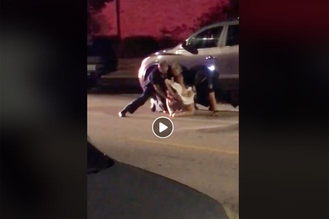 A screenshot from a viral video showing the arrest of Christopher E. Alfaro early Saturday morning in Galesburg.