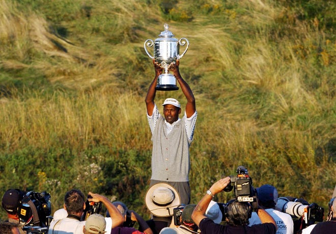 Vijay Singh holds up the Wanamaker Trophy after winning the 86th PGA Championship on April 15, 2004 at Whistling Straits in Haven, Wis. Singh is the only player in his 40s to have won the PGA Championship since 1984. [JEFF ROBERSON/AP FILE PHOTO]