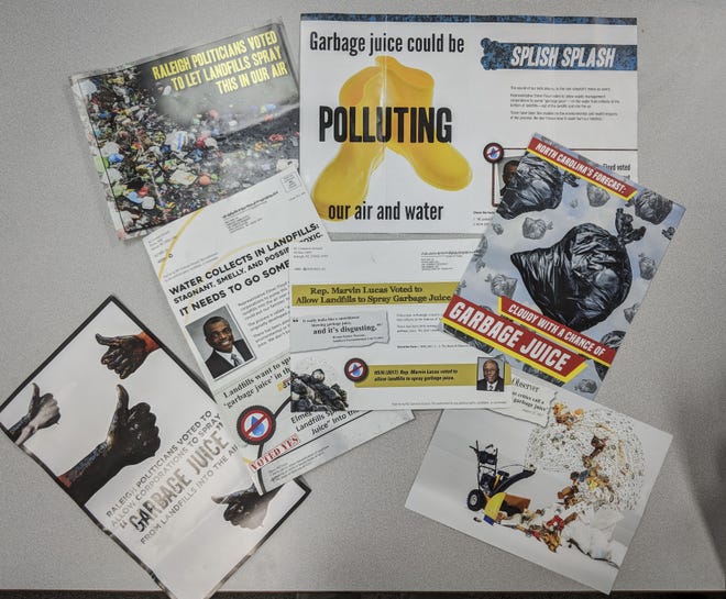 These fliers accuse state Rep. Marvin Lucas of Spring Lake and state Rep. Elmer Floyd of Fayetteville of supporting legislation to allow "garbage juice" pollution. The lawmakers think the ads violate campaign finance laws. [Paul Woolverton/The Fayetteville Observer]