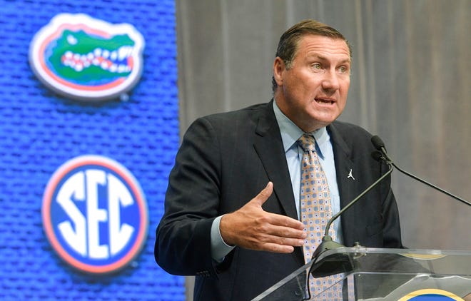 Florida head coach Dan Mullen speaks during the NCAA college football Southeastern Conference media days at the College Football Hall of Fame in Atlanta on July 17, 2018. Mullen has no illusions about his quarterback situation. Especially not after nearly a week of practice. Mullen made it clear Monday, Aug. 6, 2018 that Feleipe Franks, Kyle Trask and freshman Emory Jones have a long way to go to meet his lofty expectations. He said it might not happen this season or even next year. (AP Photo/John Amis)