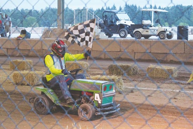 The first ever lawnmower races came to the Cheboygan County Fair Tuesday night, with several heat races, a semi-final and a feature race. Trophies were given out to the winner of the semi-final race and the feature race.