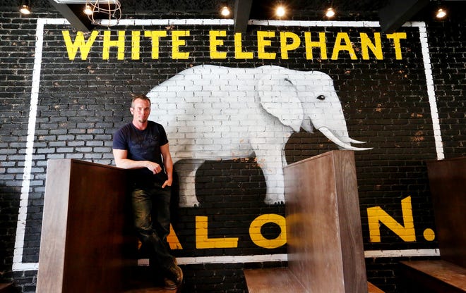 Artist Jesse Corlis painted this White Elephant on the wall of a Pies & Pints in the Short North in 2015. This location has closed. [Dispatch file photo]