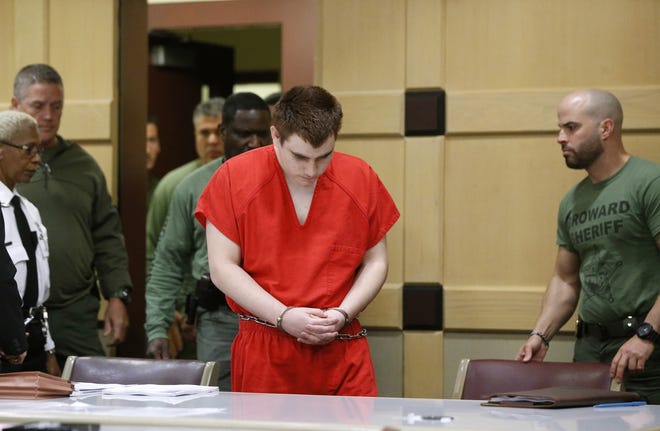School shooting suspect Nikolas Cruz arrives Friday at a Broward County courtroom for a hearing in Fort Lauderdale. [Wilfredo Lee/AP File]