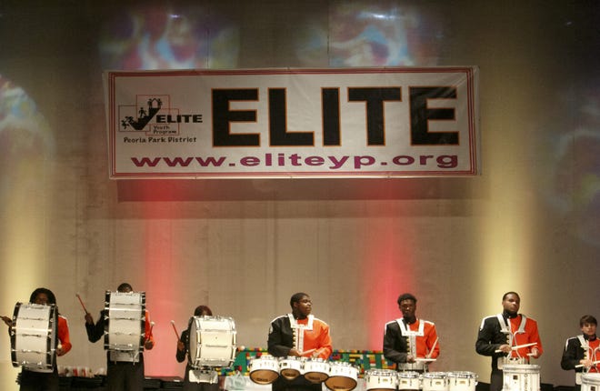 JOURNAL STAR FILE PHOTO



The Manual drumline performs at the ELITE graduation at Riverside Community Church in 2014.