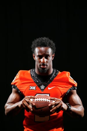 Oklahoma State junior Justice Hill led the Big 12 Conference last season in rushing yards (1,467) and rushing touchdowns (15). [Photo by Nate Billings, The Oklahoman]