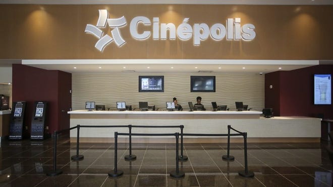 The concierge at the Cinepolis Jupiter movie theater in July 2015. (Bruce R. Bennett / Palm Beach Post file photo)
