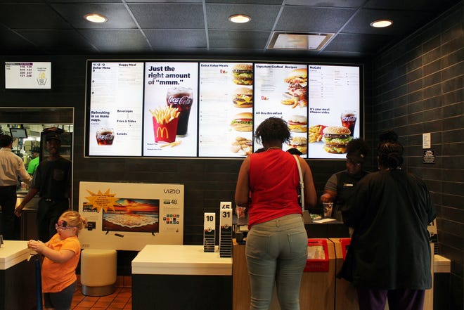 The McDonald's in Hopewell, located at 5214 Oaklawn Blvd., unveils a new look at a grand re-opening event on Aug. 4, 2018. [Kelsey Reichenberg/progress-index.com]