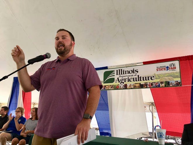 In this Aug. 2, 2018 photo, Illinois State Fair Manager Luke Sailer previews coming attractions in the 2018 Illinois State Fair in Springfield, Ill. The state fair runs from Aug. 9-19 at the state fairgrounds in Springfield.(AP Photo by John O'Connor)