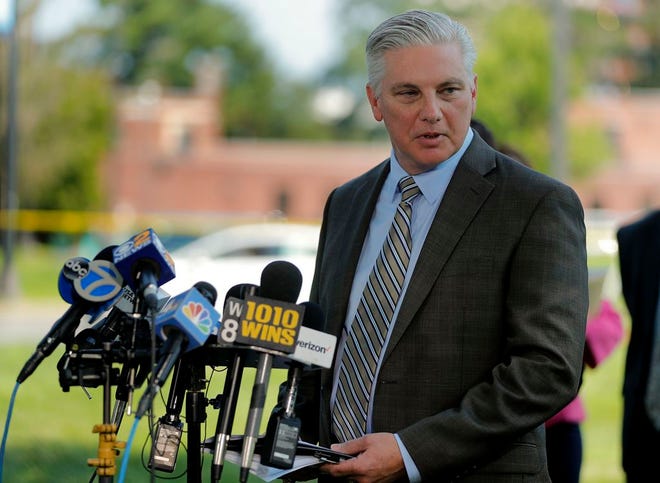 Westchester County Police Commissioner Thomas Gleason answers questions during a news conference outside Westchester Medical Center, Wednesday, Aug. 8, 2018, in Valhalla, N.Y. A man shot a female patient and then killed himself at the suburban New York hospital Wednesday, police said.(AP Photo/Julie Jacobson)
