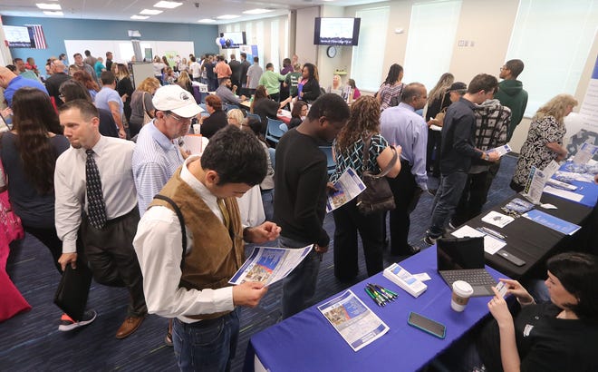 Job seekers converged on the Daytona State College Palm Coast campus for Flagler Counties annual Job Fair Friday February 23, 2018. [News-Journal/Jim Tiller]