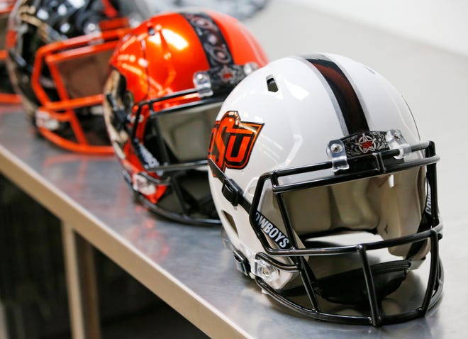 Oklahoma State football helmets are pictured. [The Oklahoman archives]
