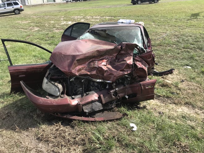 Seven people, including an infant, were transported to four different hospitals after they were involved in a two-vehicle wreck on U.S. 441 Thursday. [Austin L. Miller/Staff]