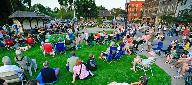 Music lovers gather on Warwick's Railroad Green for the live music presented during Hudson Valley Jazz Festival. [TIMES HERALD-RECORD FILE PHOTO]