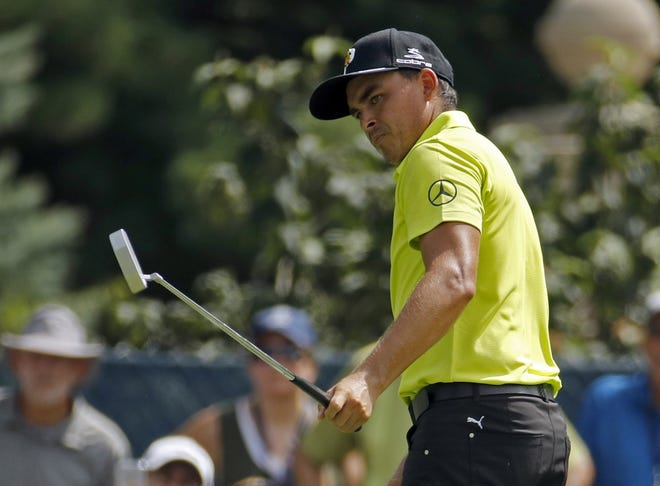 Rickie Fowler wears a yellow shirt in memory of Australian golfer Jarrod Lyle, who died of leukemia Wednesday. Lyle liked to wear a yellow hat when he played. [The Associated Press]