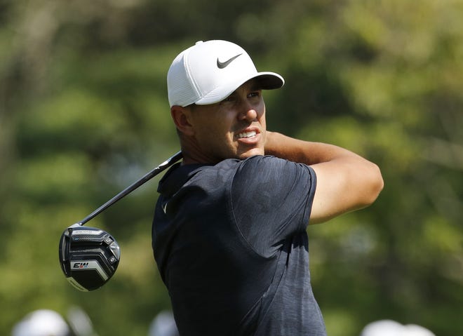 Brooks Koepka watches his shot from the fourth tee during the second round of the PGA Championship at Bellerive Country Club in St. Louis on Friday. [AP PHOTO]