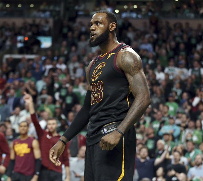 LeBron James, shown celebrating a basket against the Celtics on May 27, is scheduled to return to TD Garden on Feb. 7 as a member of the Lakers. [AP File Photo/Elise Amendola]