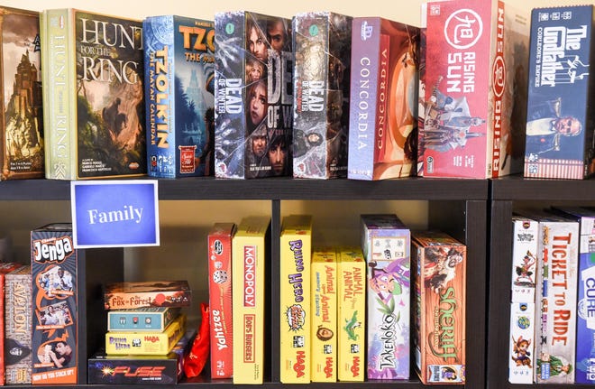 Sapphire City Board Game Parlor in North Canton offers the opportunity for patrons to play board games at $5 per person, per day. (Michael Balash/CantonRep.com)