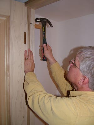 Installing a pre-hung door requires attention to detail. [TRIBUNE CONTENT AGENCY]