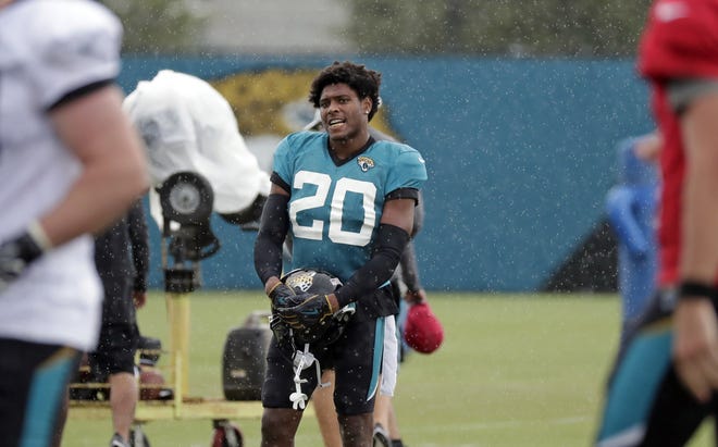 Jacksonville Jaguars cornerback Jalen Ramsey (20) takes a break during a practice at NFL football training camp, Tuesday, July 31, 2018, in Jacksonville, Fla. (AP Photo/John Raoux)