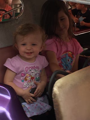 Izabela (left), 1, and Addison, 4, enjoy Nickel Day. It was actually Izabela’s second Nickel Day and she was finally big enough to enjoy the rides. The photo was submitted by Jessica Hayward.