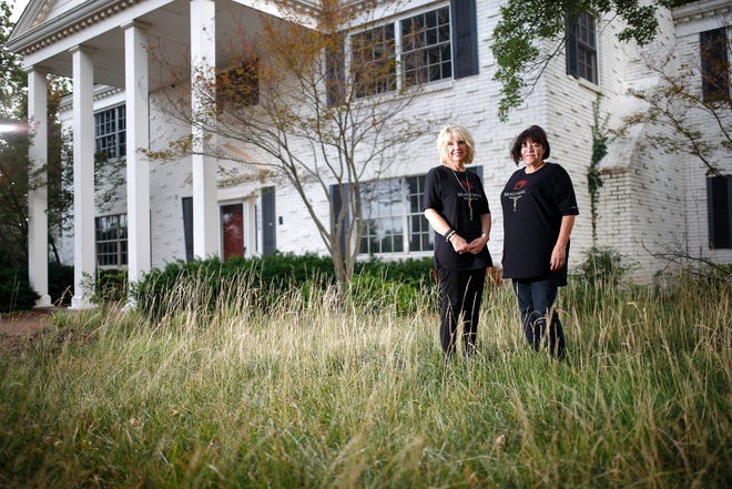 Kaylene Balzer and Lisa Clark, founders of Beautiful Restoration ministry, pose for a photo at the "Mansion on the Hill" at 19000 Terra Place in Edmond. [Photo by Sarah Phipps, The Oklahoman]