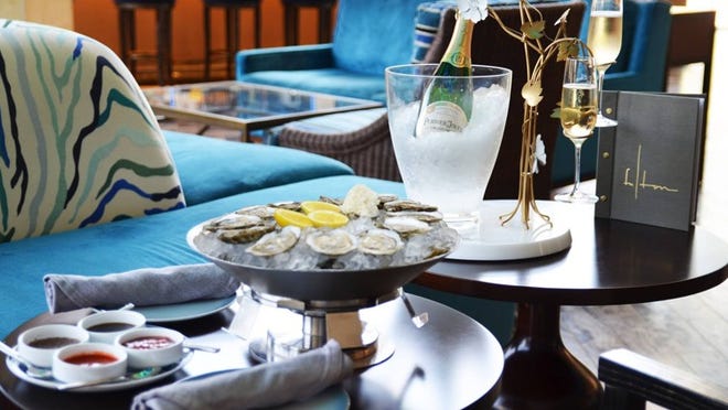Sip champagne while shucking oysters at a monthly Fairmont Austin happy hour, this time benefiting the Central Texas Food Bank. Contributed