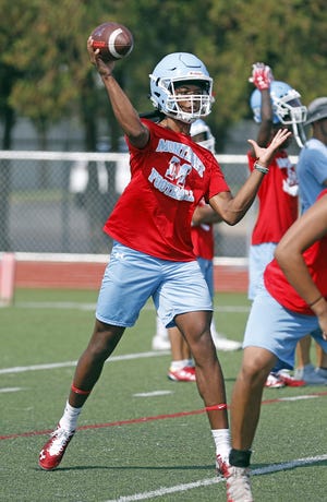 Monterey's Coreon Bailey passes the ball during Tuesday practice at Monterey High School. Bailey, a junior, is expected to share reps with senior signal caller Hayden Malone. [Brad Tollefson/A-J Media]