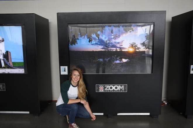 MacKenzie Hennessey with her winning entry in the ESPN X Games ZOOM photo contest. [COURTESY PHOTOS]