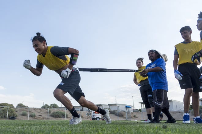Excelsior's Joseph Zamora particpates in a drill during a summer practice. [James Quigg, Daily Press]