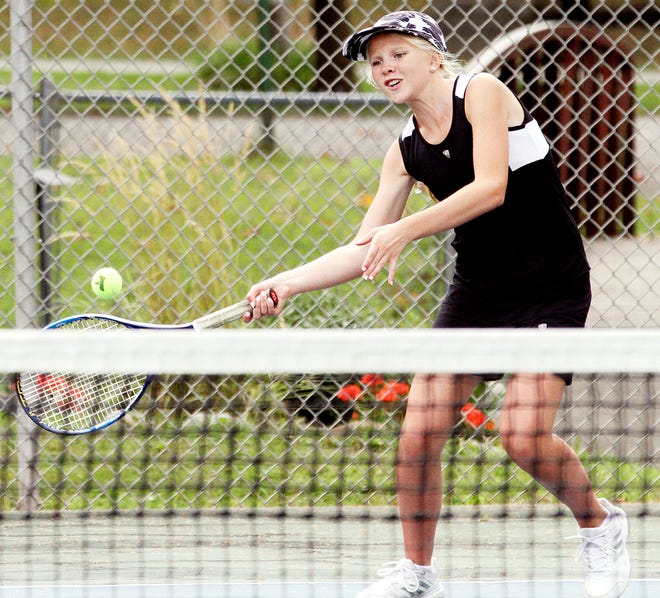 Ashland High's Korinne Harris returns a shot during a tennis match last season. Harris, who will play at first singles this year, is the Arrows' lone returning letterwinner.
