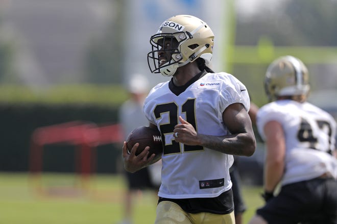 New Orleans Saints cornerback Patrick Robinson (21) goes through drills during training camp on July 27 in Metairie, La. [AP Photo/Gerald Herbert]