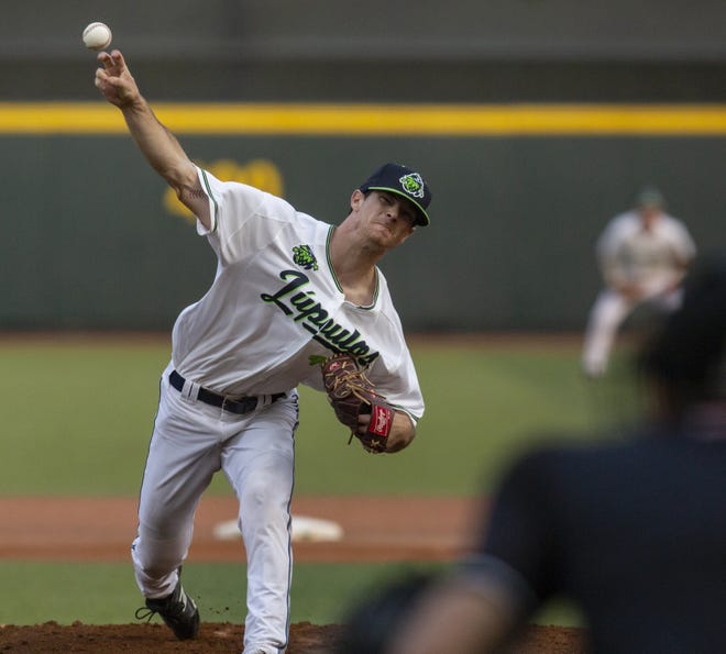 Hillsboro pitcher Matt Mercer throws a pitch against the Eugene Emeralds on Wednesday. The former Oregon pitcher had five strikeouts and allowed three hits and three runs in three innings. [Ben Lonergan/The Register Guard]