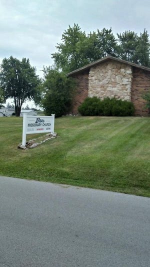 A new sign, made by JR Glasgow and installed by David Carr, was put up on July 18 in front of the Monmouth Bible Missionary Church. [PHOTO PROVIDED]