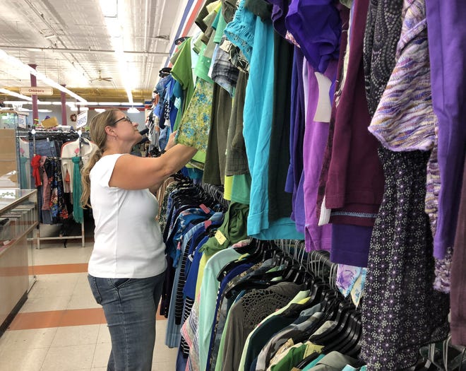 Dawn Stanziano shops at the Salvation Army thrift store on Main Street in Canandaigua. [MIKE MURPHY/MESSENGER POST MEDIA FILE PHOTO]