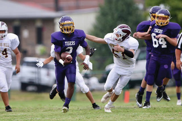 Whitthorne’s Nicholas Butler (2), eluding the tackle attempt by Spring Hill’s Grant Isbell (51), rushed for 27 yards on nine carries and added a 45-yard interception return for a touchdown Thursday as the Tigers defeated the Generals 14-0. (Photo by correspondent Rob Fleming)