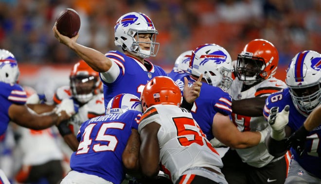 Buffalo Bills quarterback Josh Allen throws a pass during the first half against the Cleveland Browns on Friday in Cleveland. (AP Photo/Ron Schwane)