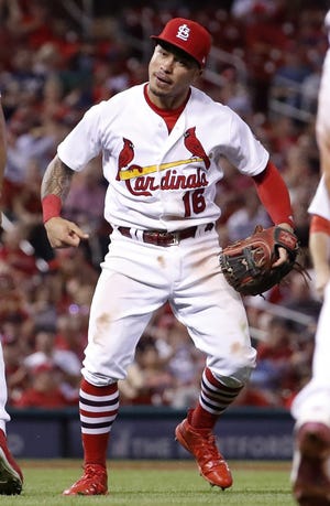 St. Louis Cardinals second baseman Kolten Wong celebrates after throwing Milwaukee Brewers' Keon Broxton out at first during the eighth inning of Friday's game in St. Louis. (AP Photo/Jeff Roberson)