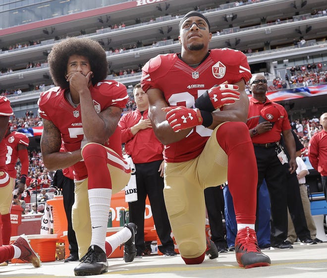 Colin Kaepernick, left, remains without an NFL job despite an offer from the Broncos in 2016. [AP Photo/Marcio Jose Sanchez, 2016 file]
