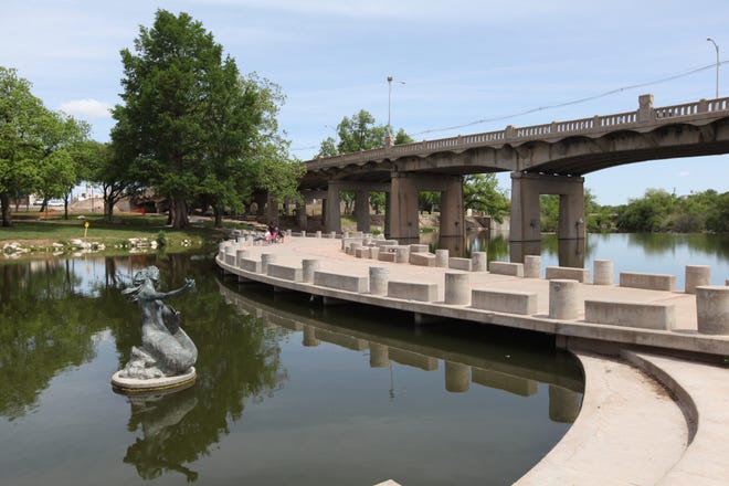 The city's beautiful riverwalk includes a pedestrian bridge over the Concho River linking downtown with the Old Town district in San Angelo, TX; April 27, 2018 (Steve Stephens/Columbus Dispatch)