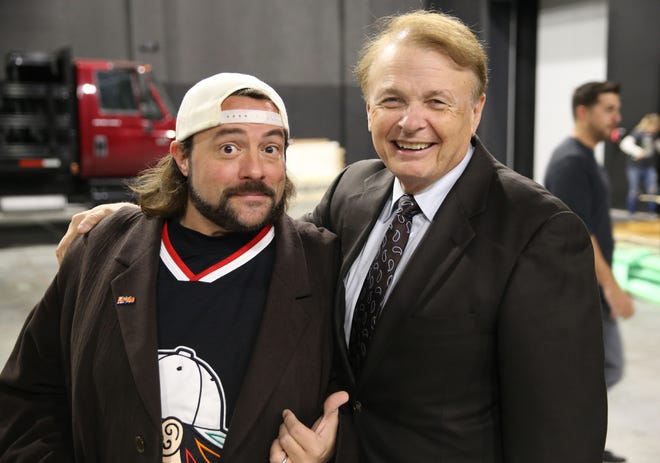 Kevin Smith, left, poses with Ringling College of Art & Design President Larry Thompson. The Hollywood Reporter named Ringling College the 15th top film school in America, citing how students got to work on projects including Smith's new film "Killroy Was Here." [Courtesy photo Rich Schineller]