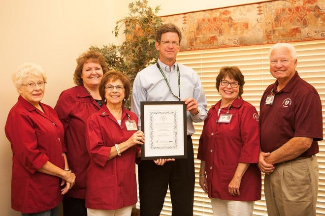 Members of the Fairchild Medical Center Auxiliary were joined by FMC CEO Jonathon Andrus and FMC board Executive Director Elizabeth Langford (not pictured) to accept an award for the hospital's efforts in promoting organ, eye and tissue donation awareness and registration. From left are Marian Hamilton, Connie Hendryx, Robin Watson, Andrus, Debby Whipple and Walt Pryor.